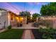 Cozy backyard with a patio and lights, perfect for outdoor gatherings and relaxation at 5125 Umatilla St, Denver, CO 80221