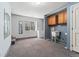 Spacious laundry room includes storage cabinets, utility sink and extra space at 185 S Hoyt St, Lakewood, CO 80226