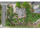Aerial view of the home showcasing mature trees, landscaping and walking paths at 1999 Champions Cir, Castle Rock, CO 80104
