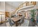 Elegant dining room with high ceilings, staircase, and ample natural light at 1999 Champions Cir, Castle Rock, CO 80104