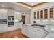 Well-equipped kitchen with granite countertops, stainless steel appliances, and ample cabinet space at 1999 Champions Cir, Castle Rock, CO 80104