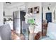 Eat-in kitchen with table and chairs and stainless steel refrigerator at 1595 Macarthur Dr, Boulder, CO 80303