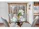 Eat-in kitchen with table and chairs, stainless steel dishwasher, and sliding glass door at 1595 Macarthur Dr, Boulder, CO 80303