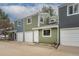 Townhome exterior with multi-tone paint and attached garages at 1595 Macarthur Dr, Boulder, CO 80303