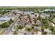 Aerial view of a residential neighborhood with a lake, green spaces, and varied architectural styles at 2582 Beech Ct, Golden, CO 80401