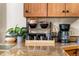 Well-organized kitchen with granite countertops, wooden cabinets, and modern appliances offers functionality and style at 609 Brook Dr, Idaho Springs, CO 80452