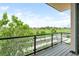 Private balcony offering scenic views of the train station and surrounding landscape at 1208 Quitman St # 305, Denver, CO 80204