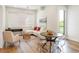 Bright living room with modern furniture, large windows, and stylish decor at 1208 Quitman St # 305, Denver, CO 80204