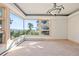 Sun-filled bedroom featuring large windows with scenic views at 23655 Currant Dr, Golden, CO 80401