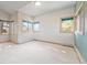 Bright bedroom with large windows offering scenic views at 23655 Currant Dr, Golden, CO 80401