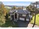 Beautiful two-story home featuring a neutral color palette, tile roof, and picturesque mountain views at 23655 Currant Dr, Golden, CO 80401
