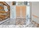 Grand foyer features marble floors, statement walls, and an elegant double door entryway at 23655 Currant Dr, Golden, CO 80401