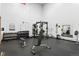 Community gym featuring free weights, benches, weight machines, and mirrors for a complete fitness experience at 23655 Currant Dr, Golden, CO 80401