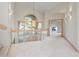 Hallway with natural light, and views of living area at 23655 Currant Dr, Golden, CO 80401