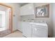 Convenient laundry room with modern washer and dryer at 23655 Currant Dr, Golden, CO 80401