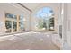 Open-concept living room with an elegant fireplace, lots of natural light, and an open layout at 23655 Currant Dr, Golden, CO 80401