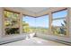 Corner windows offering mountain views and filling the room with natural light at 23655 Currant Dr, Golden, CO 80401
