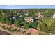Aerial view of the property featuring a large backyard and lush tree coverage at 9375 Webster Way, Westminster, CO 80021