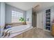 Bathroom featuring soaking tub, separate shower, and built-in shelving at 9375 Webster Way, Westminster, CO 80021