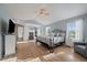 A spacious bedroom with vaulted ceiling, hardwood flooring, and a fireplace nearby at 9375 Webster Way, Westminster, CO 80021