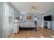Spacious bedroom featuring hardwood floors, light blue walls and an airy feel at 9375 Webster Way, Westminster, CO 80021