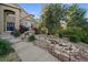 Detailed view of a rock water feature in the front yard landscaping at 9375 Webster Way, Westminster, CO 80021