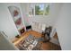 Elevated view of open concept living room, featuring hardwood floors, fireplace and lots of natural light at 9375 Webster Way, Westminster, CO 80021