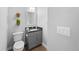 Small gray and white bathroom featuring decorative accents at 3522 S Ogden St, Englewood, CO 80113