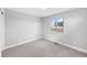 Spare bedroom featuring a large window for lots of natural light at 3522 S Ogden St, Englewood, CO 80113