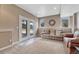 Finished basement with tile and carpet and a large set of french doors leading to the front yard at 8707 Windhaven Dr, Parker, CO 80134