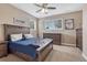 This spacious bedroom boasts ample storage with two dressers and great light from two windows at 8707 Windhaven Dr, Parker, CO 80134