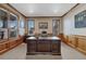 Stylish office with wood trim and ample natural light at 8707 Windhaven Dr, Parker, CO 80134
