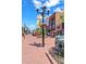 Lamppost in a brick-paved town square with shops at 2850 E College Ave # 2, Boulder, CO 80303