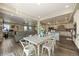 Spacious dining room with views of the open living spaces and access to both the kitchen and the office at 3871 Starry Night Loop, Castle Rock, CO 80109