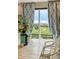 Bright dining room with view of open space; features stylish curtains, table, and chairs at 3871 Starry Night Loop, Castle Rock, CO 80109