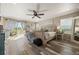 Spacious main bedroom featuring balcony access, ceiling fan and stylish decor at 3871 Starry Night Loop, Castle Rock, CO 80109