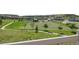 Enjoy views from the deck of the neighborhood park, walking paths, sports court and lush green spaces at 3871 Starry Night Loop, Castle Rock, CO 80109