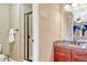 Bathroom with walk-in shower, vanity, and granite countertops at 10375 Knollside Dr, Parker, CO 80134