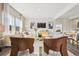 Spacious living room featuring modern furnishings, stylish decor, and hardwood floors at 2153 Flower Blossom Ave, Brighton, CO 80601