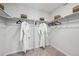 Walk-in closet with shelving and rods for storage at 2153 Flower Blossom Ave, Brighton, CO 80601