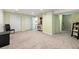 Finished basement featuring neutral colored walls and plenty of open space at 930 Button Rock Dr # 28, Longmont, CO 80504