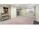Spacious basement area with plush carpeting and ample natural light from the window at 930 Button Rock Dr # 28, Longmont, CO 80504