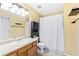 Traditional bathroom featuring a shower/tub combo and vanity with ample storage at 930 Button Rock Dr # 28, Longmont, CO 80504