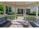 View of townhomes through a gazebo with benches and walkway at 930 Button Rock Dr # 28, Longmont, CO 80504
