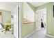 Upstairs hallway featuring a home office and neutral toned walls at 930 Button Rock Dr # 28, Longmont, CO 80504