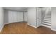 Spacious finished basement with wood flooring and ample closet space at 6963 S Albion St, Centennial, CO 80122