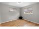 Simple bedroom with hardwood floors and a window at 6963 S Albion St, Centennial, CO 80122