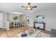 Dining room features hardwood floors and kitchen access at 6963 S Albion St, Centennial, CO 80122