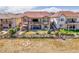 Spacious backyard with a patio, a hot tub, and mature landscaping at 6450 S Riverwood Ct, Aurora, CO 80016