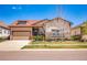 Charming single-Gathering home featuring a manicured lawn and an attached two-car garage at 6450 S Riverwood Ct, Aurora, CO 80016